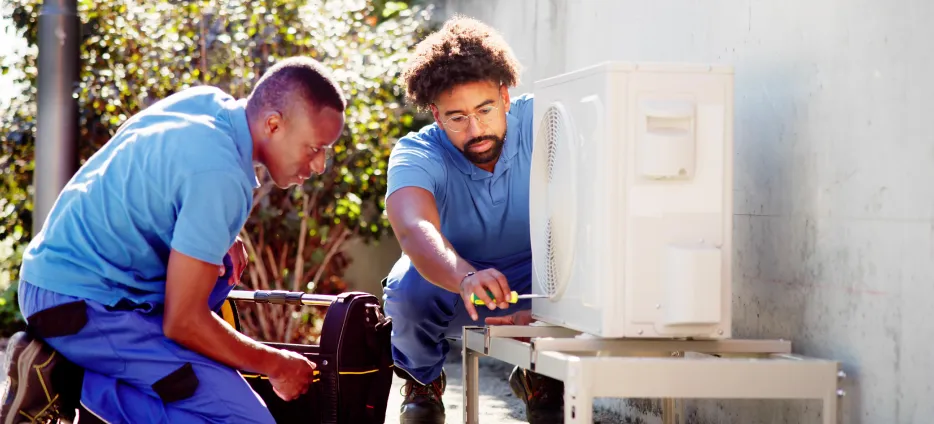 Two team members working